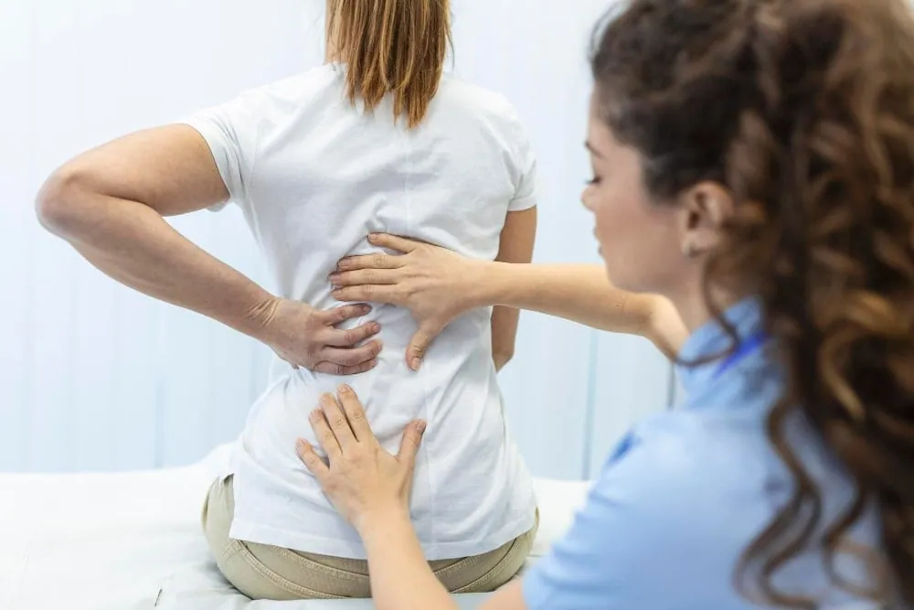 How We Treat Back Pain After a Car Accident at Palm Wellness Center