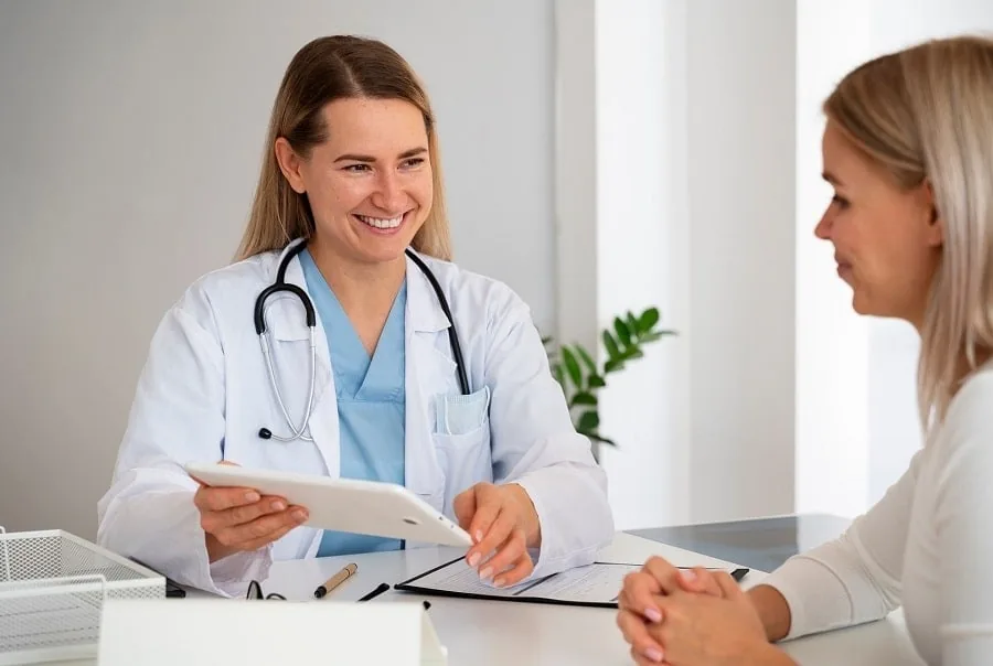 A provider reviewing a care plan with a patient at Palm Wellness Center in Tampa